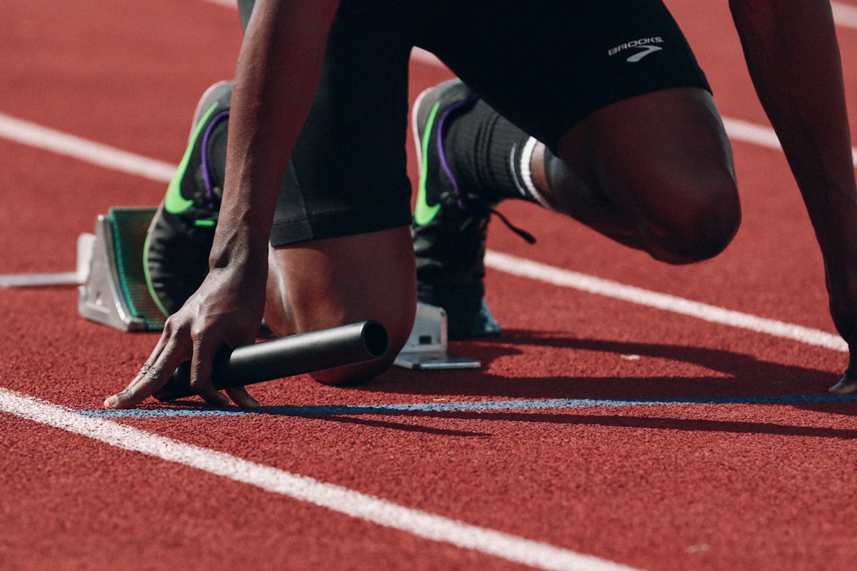 An athlete preparing to run on a track